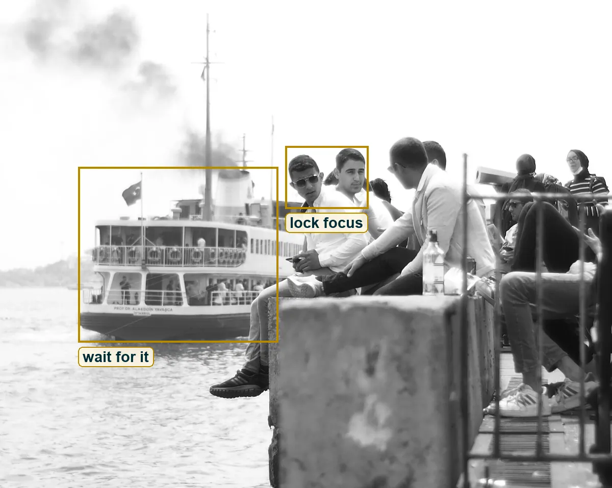 Full photo with the faces marked as the focus point and the ferry marked as the thing to wait for