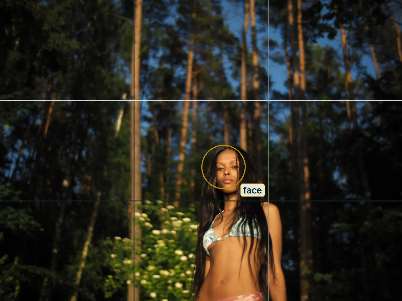 Full photo with a thirds grid and a circle around the woman's face on the right third