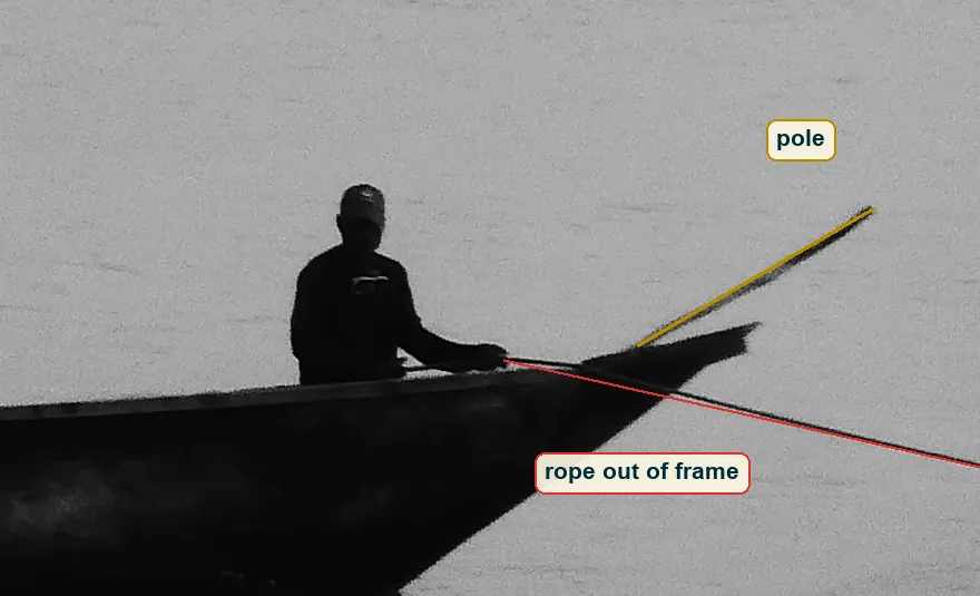 Crop of the bow with a man in a cap, a pole rising to the right and a rope running out of frame